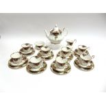 A ROYAL ALBERT 'OLD COUNTRY ROSES' TEASET comprising eight tea cups, saucers and side plates,
