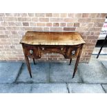 A WILLIAM IV MAHOGANY INLAID BOW FRONT LOWBOY with central shallow drawer flanked by pair of deep