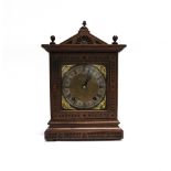 A 19TH CENTURY OAK CASED MANTLE CLOCK the 8-day movement stamped 'W & H Sch' for Winterhalder &