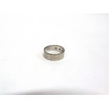 A WEDDING RING stamped 'Platinum', 6g gross