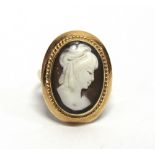 A SHELL CAMEO RING with continental 585 mark, finger size P, 5.1g gross.