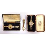 A LADY'S 18 CARAT GOLD WRIST WATCH on a metal bracelet, cased; and another similar by Rotary