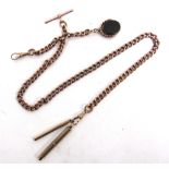 A 9 CARAT GOLD WATCH CHAIN of uniform curb links, with a T bar and swivel, attached is a double