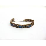 AN ENAMEL AND FILIGREE BRACELET stamped 'Silver', probably Chinese