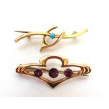 A 9 CARAT GOLD BROOCH set with three garnets; and a turquoise set wishbone bar brooch; 2.7g gross