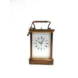 A BRASS REPEATING CARRIAGE CLOCK the enamel dial inscribed 'MATTHEW NORMAN LONDON', 10cm high 8.