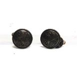 A PAIR OF FRENCH SILVER CUFFLINKS the circular panel with Triskel motif, the back panel with a