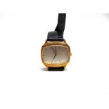 OMEGA, A GENTLEMAN'S 9 CARAT GOLD MECHANICAL WRISTWATCH on a strap, 1974 London import mark, the