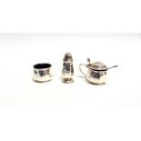 A THREE PIECE SILVER MATCHED CRUET SET maker D & B, Birmingham 1925 and 1926, of ocatagonal form,