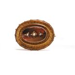 A 9 CARAT GOLD VICTORIAN BROOCH Chester 1889, set with graduated seed pearls to an oval panel, 3.8cm