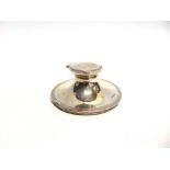 A SILVER CAPSAN INKWELL by Walker & Hall, Sheffield 1908, the circular loaded base with reeded