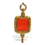 A VICTORIAN GILT METAL CORNELIAN WATCH KEY SEAL FOB