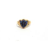 A LATE VICTORIAN 18 CARAT GOLD SARDONYX SIGNET RING the shield shaped hardstone monogrammed,