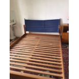A HABITAT 'AIDA' DOUBLE BED with teak frame and blue canvas headboard