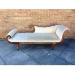 A REGENCY ROSEWOOD FRAMED CHAISE LONGUE with brass inlaid decoration on turned and reeded