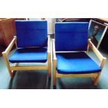 A PAIR OF 1970S HABITAT 'CAMPUS' ARMCHAIRS with blue fabric upholstery and beech frames with Pirelli