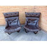 A PAIR OF NORWEGIAN 'VIKING' SLING ARMCHAIRS with brown leather and canvas upholstery on a steam