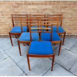 A SET OF SIX LADDERBACK DINING CHAIRS with drop-in blue fabric covered seats