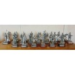 TWENTY-FOUR ROYAL HAMPSHIRE & OTHER CAST PEWTER SOLDIER FIGURINES each with a plinth base.