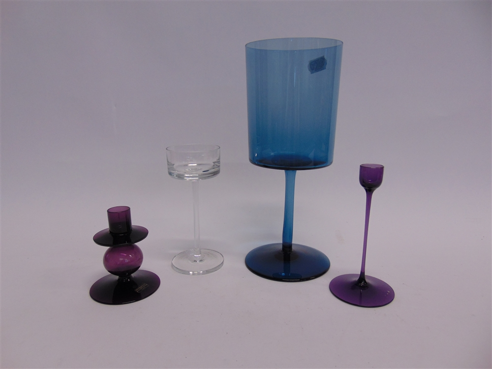 RONALD STENNETT-WILLSON FOR WEDGWOOD: an aubergine glass candlestick 11cm high, with original