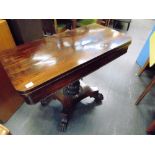 A VICTORIAN ROSEWOOD 'D' SHAPED FOLD OVER CARD TABLE the turned and carved pedestal on an