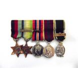 A GROUP OF FIVE MINIATURE MEDALS comprising the 1939-45 Star, Atlantic Star, with France & Germany