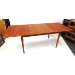 A DANISH TEAK EXTENDING DINING TABLE the rectangular top with moulded edge on slightly tapering