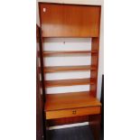 A G-PLAN TEAK WALL UNIT the upper section fitted with two door cupboard over shelves, the base