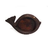TRIBAL ART - AN OCEANIC CARVED WOODEN BOWL in the form of a stylised fish, with a shell eye,