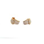 A PAIR OF 9 CARAT GOLD ASYMMETRIC DIAMOND HALF HOOP EARRINGS each set with thirty one small