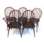 A SET OF FIVE ERCOL STICKBACK DINING CHAIRS including a carver