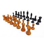 A STAUNTON PATTERN BOXWOOD & EBONY CHESS SET, PROBABLY BY JAQUES unsigned, the kings 67mm high,