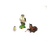 A BESWICK KOOKABURRA MODEL 1159 together with a seated foal and a 'waterline' Peter Scott wigeon (