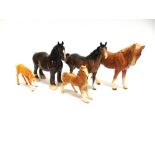A GROUP OF FIVE ASSORTED HORSE FIGURES comprising a Royal Doulton shire horse with yellow tied