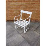 A WHITE PAINTED SLATTED SINGLE GARDEN CHAIR with scrolling cast frame