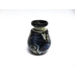 A DANISH ART POTTERY VASE with foliate decoration, impressed 'DENMARK' to base, otherwise unmarked