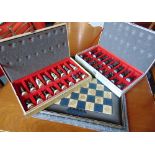 A LORD OF THE RINGS 'THE FINAL BATTLE' CHESS SET comprising opposing playing pieces, each boxed, a