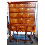 AN 18TH CENTURY WALNUT CHEST ON STAND the upper portion with three short drawers above three long