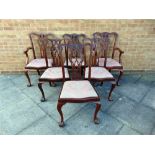 A SET OF SIX CHIPPENDALE STYLE MAHOGANY DINING CHAIRS to include two carvers, with openwork splat
