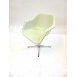 ROBIN DAY FOR HILLE: a moulded polypropylene swivel tub chair, on four prong chrome base