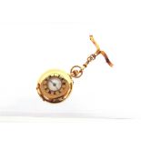 A 9 CARAT GOLD HALF HUNTER FOB WATCH keyless wound movement; on a brooch fitting stamped '9ct'; 29.