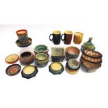 PHILLIP JOHN BENNETT: a collection of Studio Pottery dishes and bowls, and two mugs, the largest