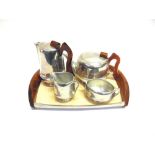 A FOUR PIECE PICQUOT WARE TEA SET on matching tray