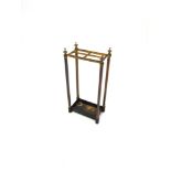 A BRASS AND CAST IRON STICK STAND 29cm wide 17cm deep 60cm high