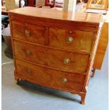 A VICTORIAN MAHOGANY BOW FRONT CHEST OF DRAWERS the two short and two long drawers with circular