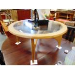 A CIRCULAR G-PLAN STYLE TEAK COFFEE TABLE with glass inset top, 90cm diameter 41cm high