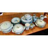 A COLLECTION OF STUDIO POTTERY STONEWARE DINNERWARE including plates, jugs and lidded tureens