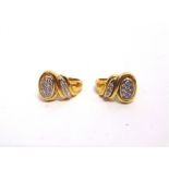 A PAIR OF 18 CARAT GOLD DIAMOND EARRINGS each set with thirteen small brilliant cuts, 10.9g gross