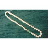 A GRADUATED ROW OF CULTURED PEARLS the fifty four pearls of approximately 6-9mm in diameter, to a
