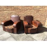A PAIR OF ART DECO CLUB ARMCHAIRS with studded Rexine upholstery, 83cm wide 85cm deep 81cm high